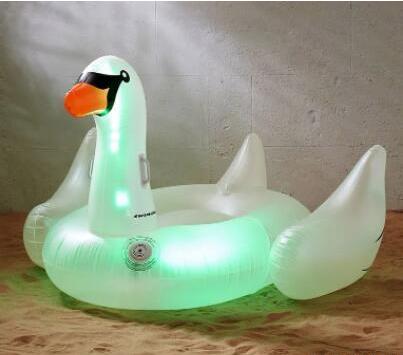 Giant LED lights up swans floating