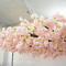 Arched artificial cherry blossom tree