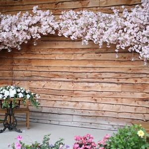 Arch artificial cherry blossom tree bakeng sa liketsahalo