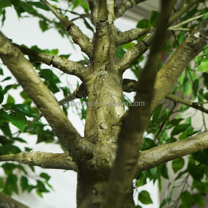 Artificial thick fiberglass trunk ficus tree