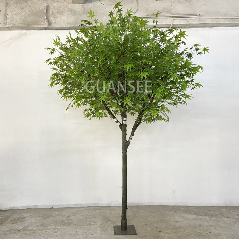 Artificial green maple leaves tree indoor
