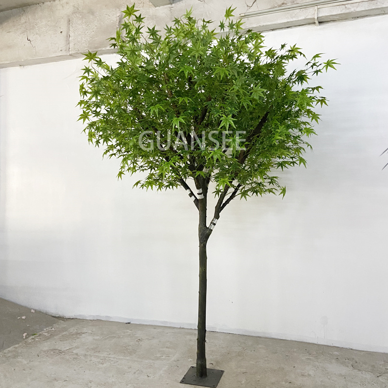 Artificial green maple leaves tree