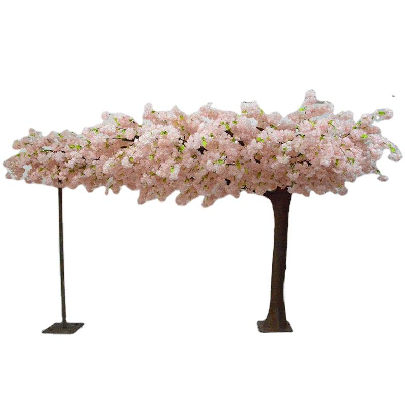Hääkaaren keinotekoinen vaaleanpunainen kirsikankukkapuu tapahtumien koristeluun