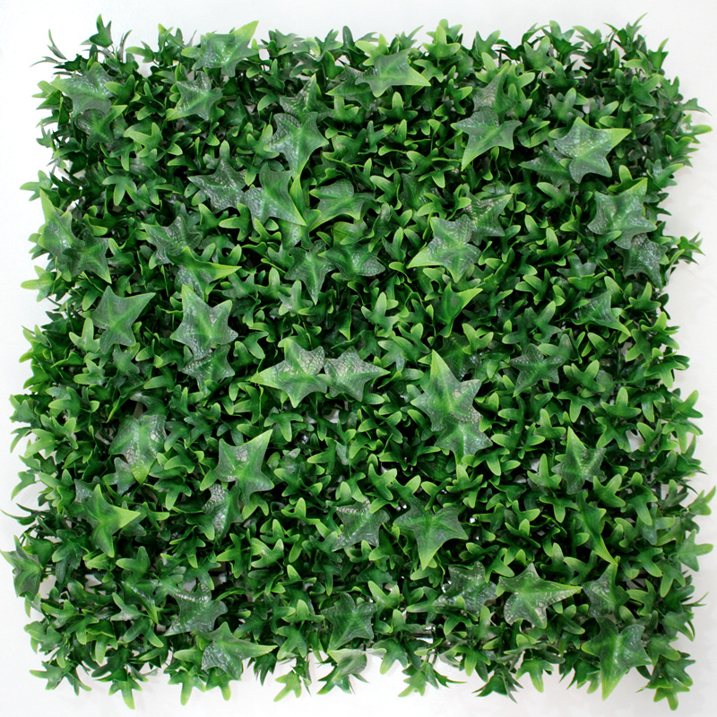 Umjetna simulirana zelena biljka u pozadini zidne biljke ukras travnjaka balkon unutarnja umjetna trava