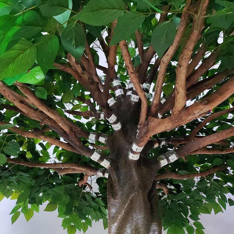 Large simulated apple tree made of fiberglass material and artificial tree trunk for garden decoration