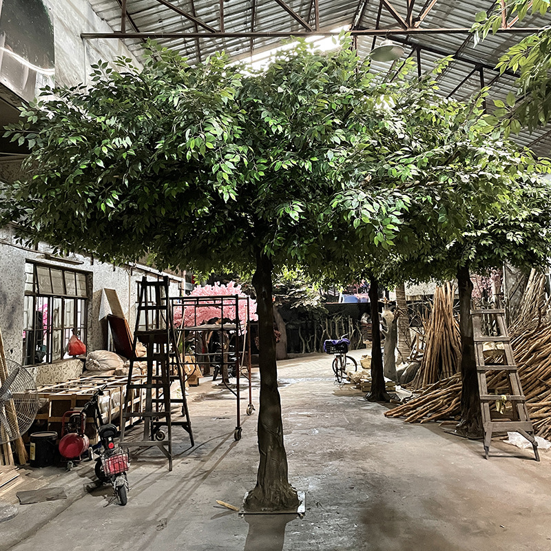 Decorative artificial banyan tree with wrapped columns