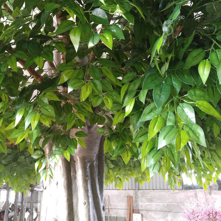 Decorative artificial banyan tree with wrapped columns