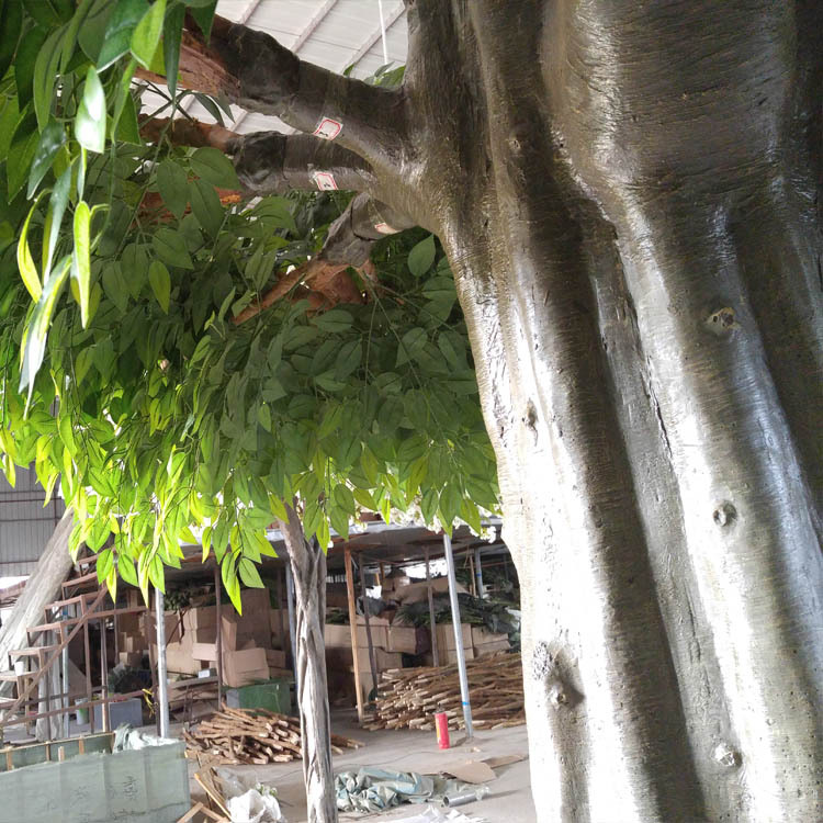 Decorative artificial banyan tree with wrapped columns