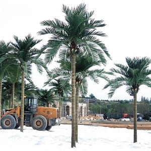 Hotellträdgård glasfiberstam konstgjord kokospalm palm konstgjord palm