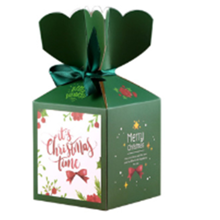 Упаковка подарункової коробки з різдвяними фруктами для подарунків
