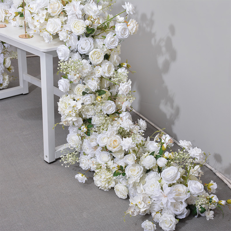 The new wedding table placed in long row of flowers wedding arch iron shelf decoration long row of flowers artificial flowers
