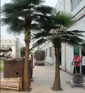 To create a tropical feel, artificial palm trees are your best choice
