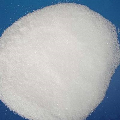 Chelating resin for magnesium removal for membrane caustic soda