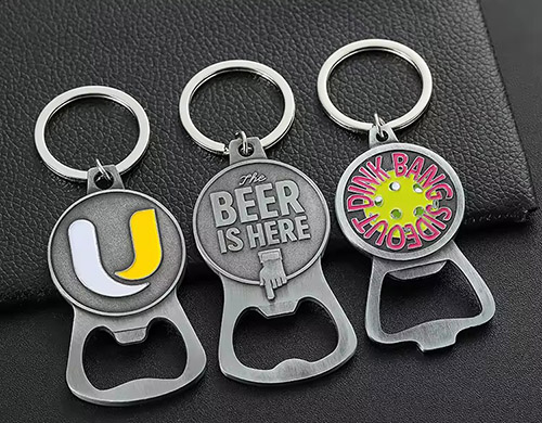 Multi-functional bottle opener key ring