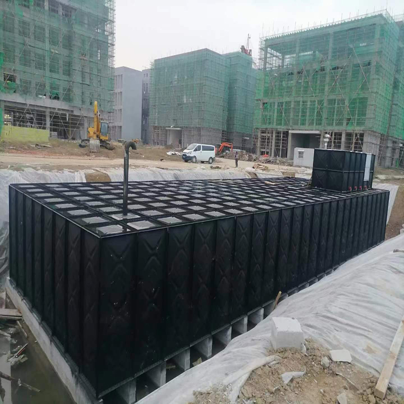 What is the capacity of a rectangular water tank?