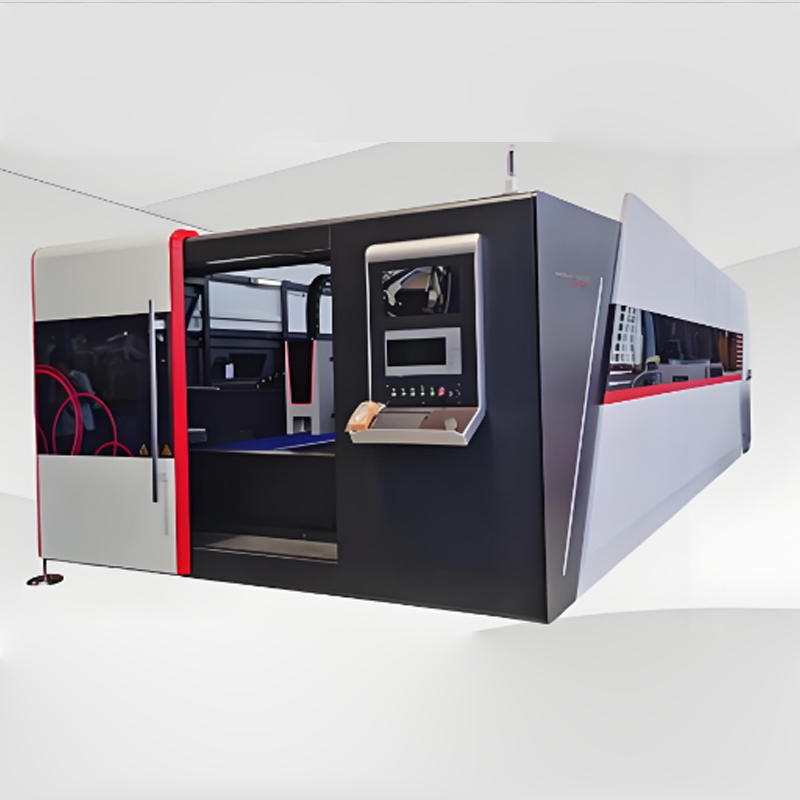 Laser cutting machine with exchange table and cover
